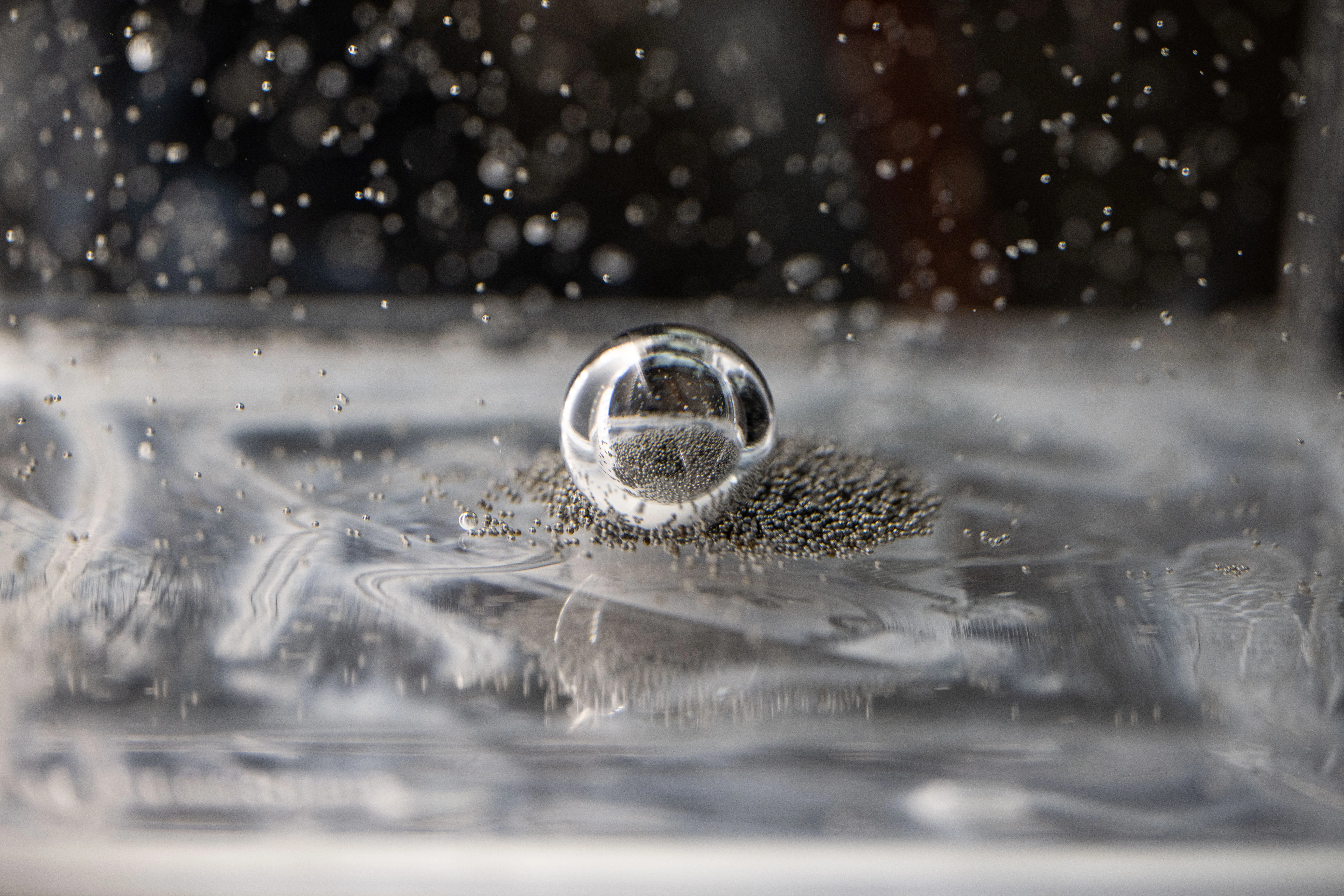 Water sphere floating in a microgravity experiment